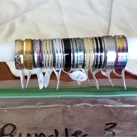 RINGS lot 11 nwt stainless steel rings various patterns and colors 18… - Picture 1 of 3